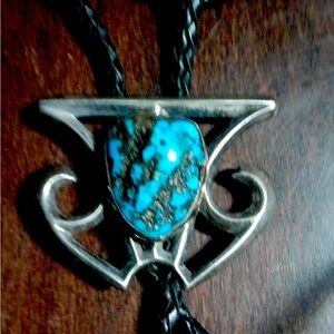 Native American bolo with turquoise stone set in a beautiful siver pennent